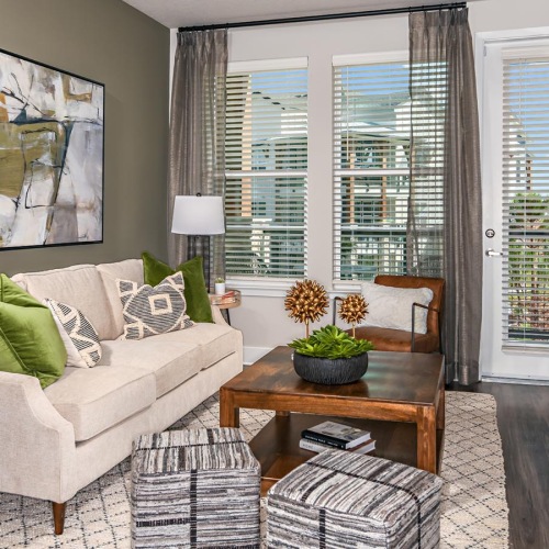 a living room with a couch and a table