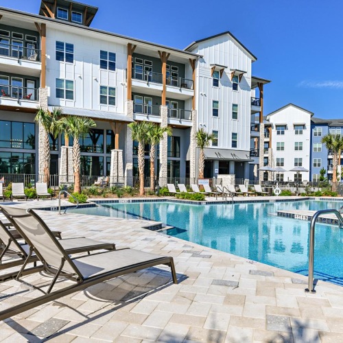 a pool next to a building