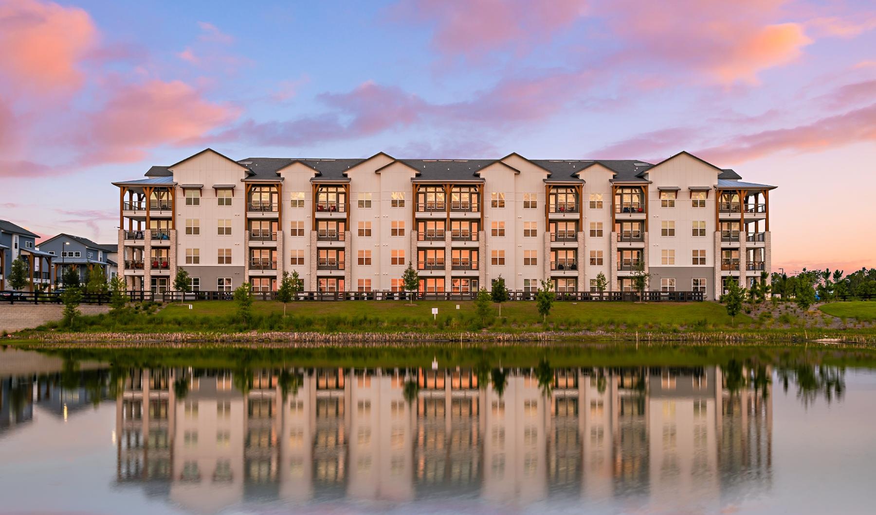 a building with a body of water in front of it